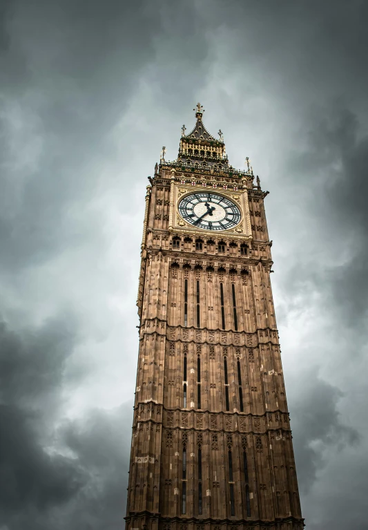 a tall clock tower that has a sky background