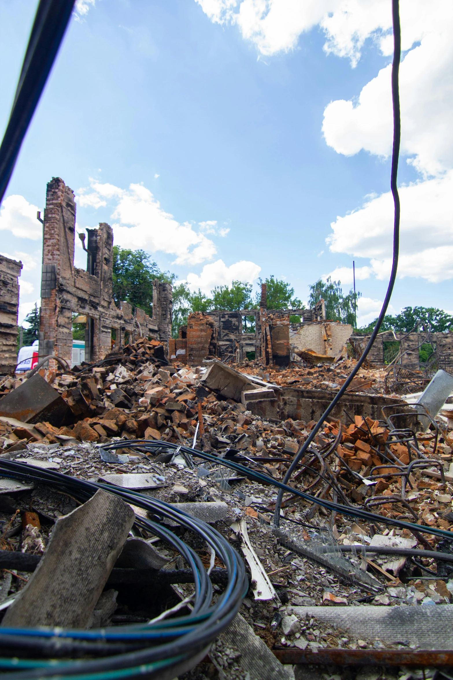 several buildings with a bunch of electrical wires in front of them