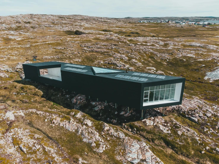 an image of a cabin out on the tun tundra