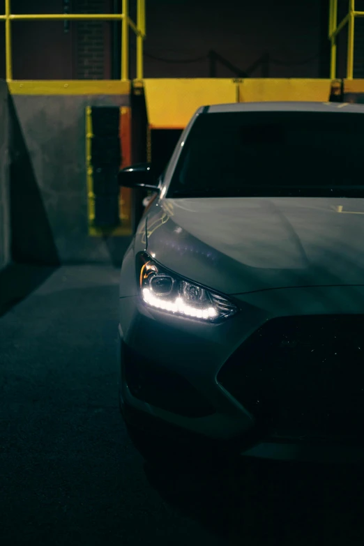 a car parked in front of a warehouse