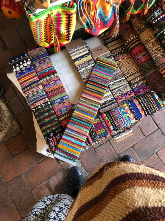 a shop with many colored items laid out on the floor