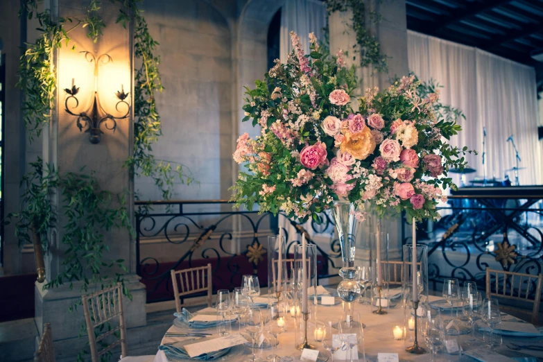 a centerpiece in an elegant setting of flowers