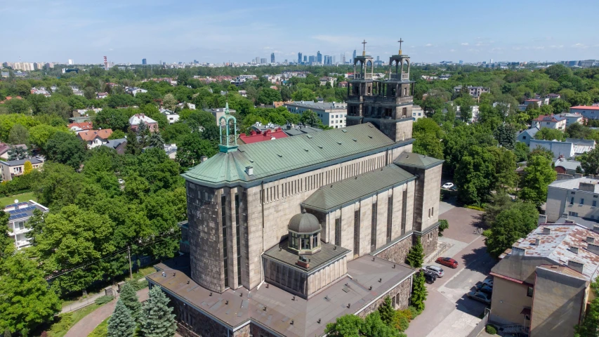 an aerial view of the church in a large city