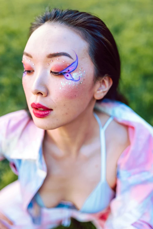 girl wearing pink and white with pink eyeshadow