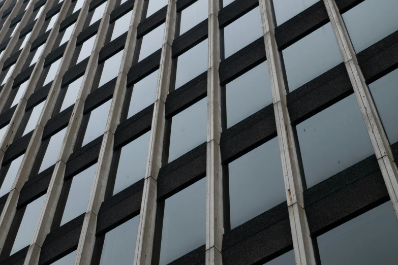 a very tall building with several windows on each side