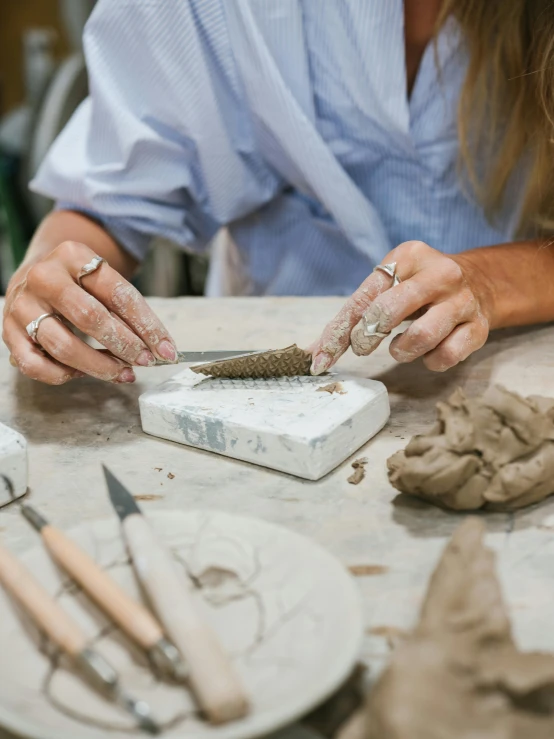 a person doing crafts in their room