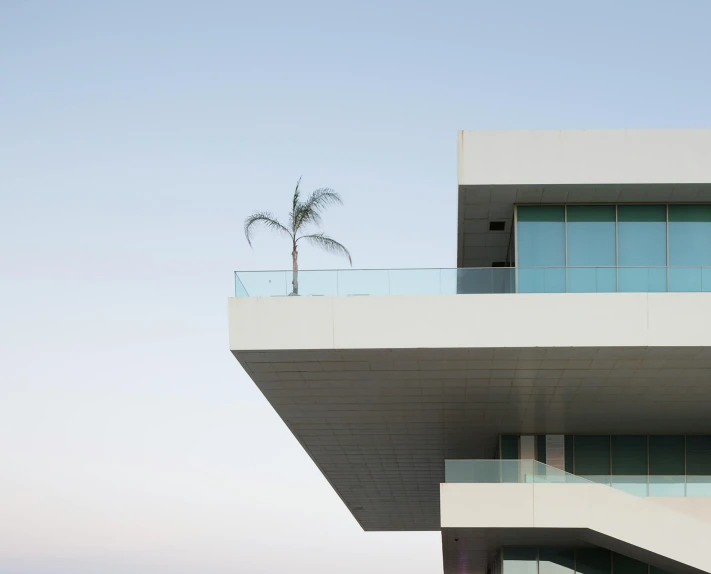 a large white building with windows on top