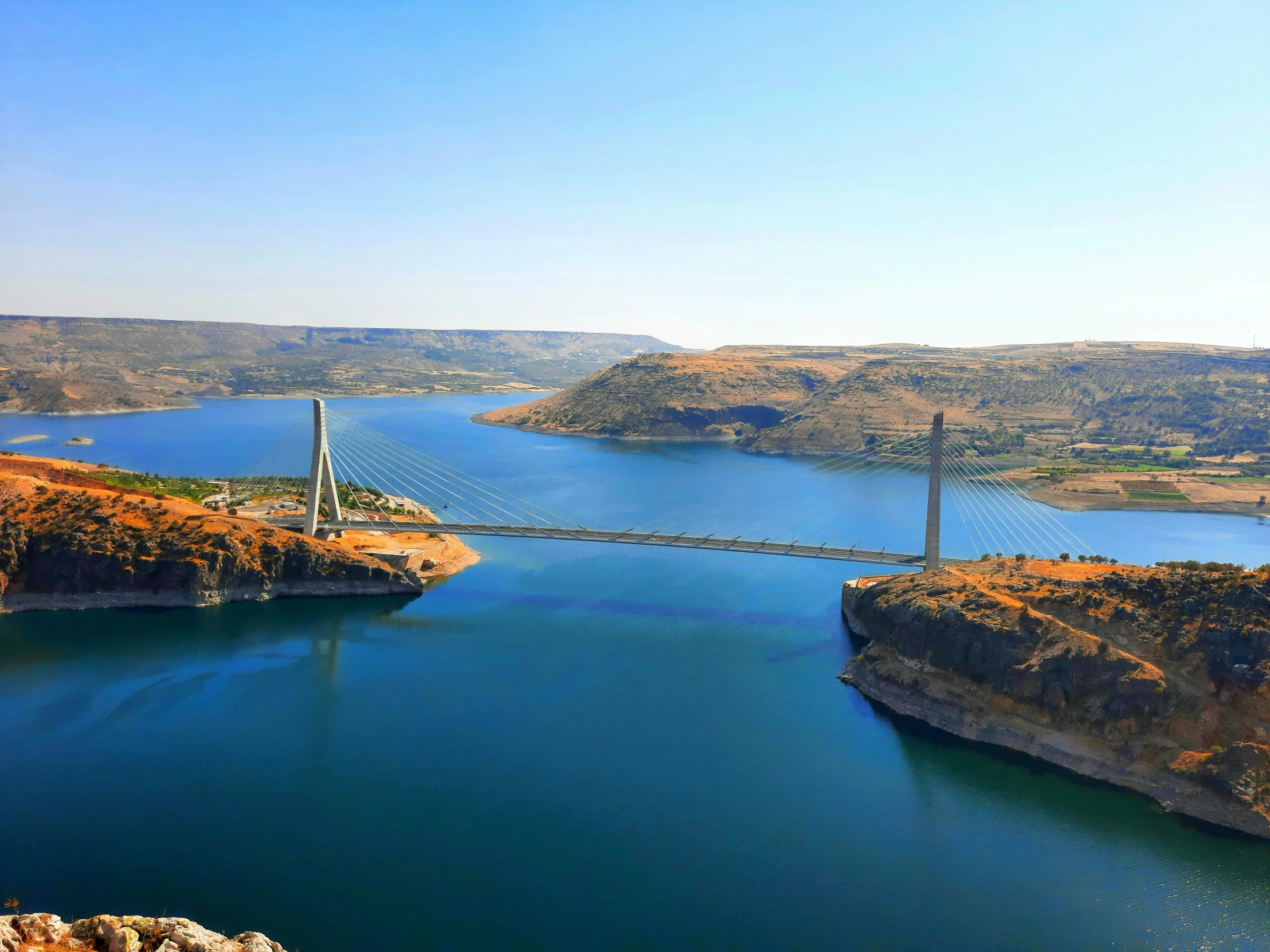 an aerial view of the columbias and bridge from above