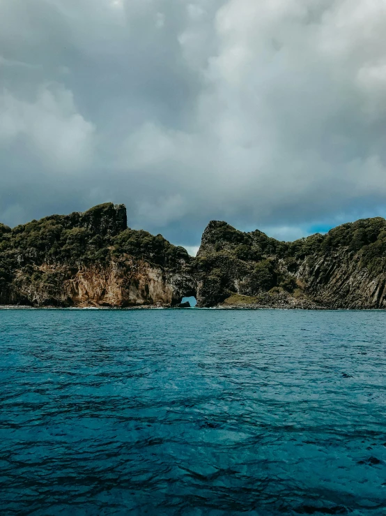 the view over the blue ocean from an island