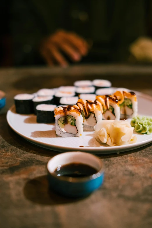 a plate that has some kind of sushi