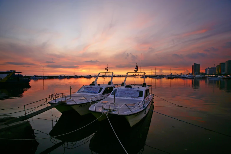 a couple of boats that are sitting in the water