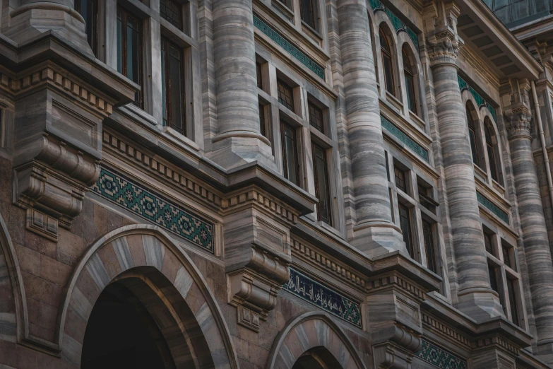 the building is large and has a clock on the front