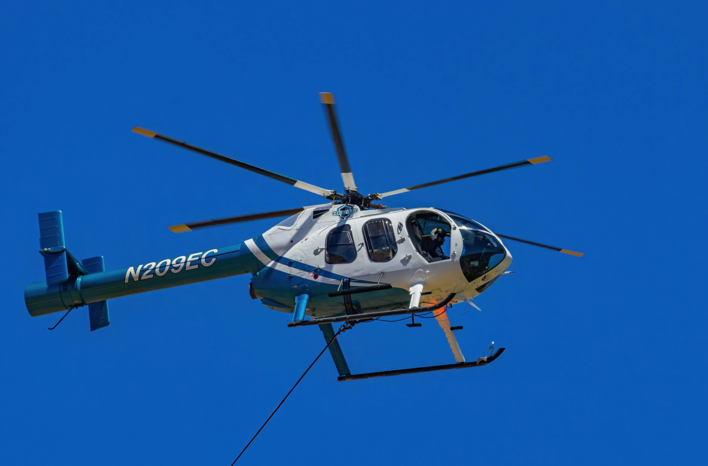 a helicopter is shown flying in the air