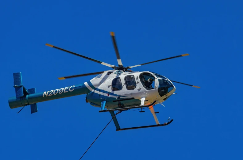 a helicopter is shown flying in the air