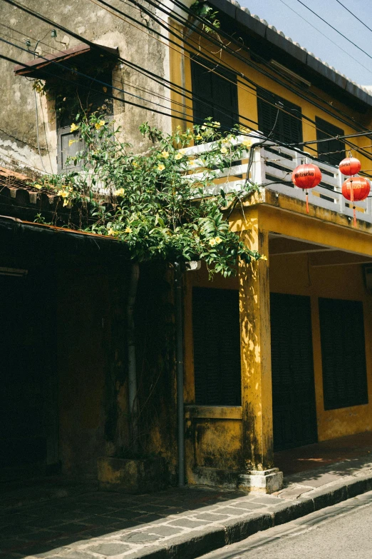 the chinese building on the corner is yellow