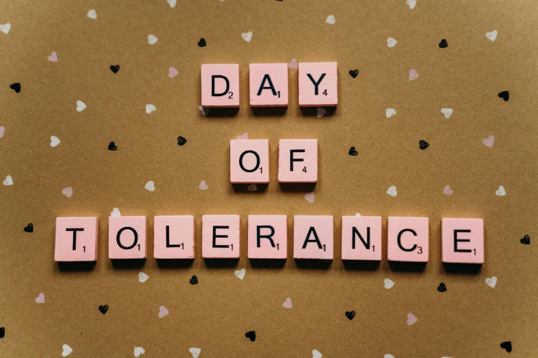 four letters spelling out the word day of tollerannce