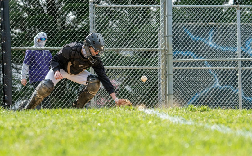 a young man who is swinging a baseball bat