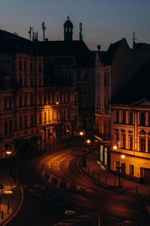 a wide view of buildings and streets at dusk