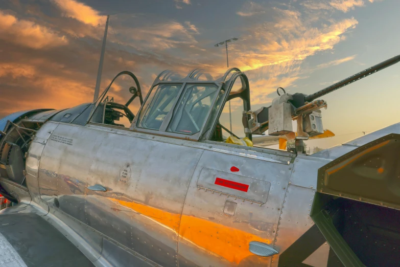 an old airplane that is sitting in the sun