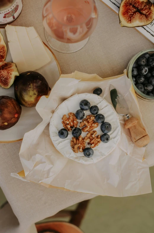 some different plates and fruit are on the table