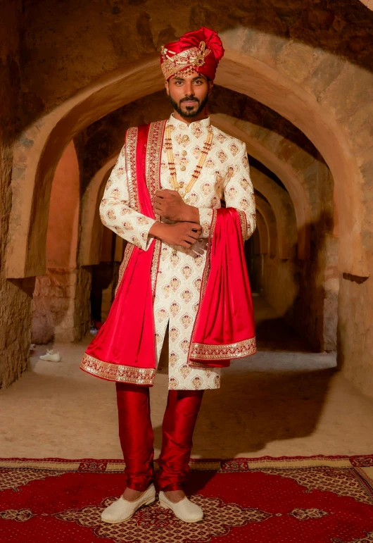 a man dressed in an indian costume