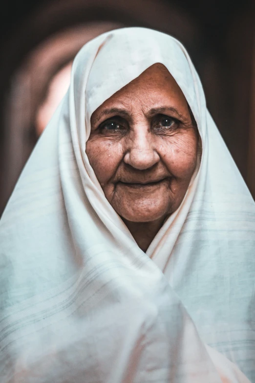 a close up po of a smiling older woman