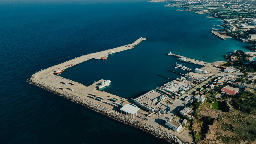 a boat dock sitting next to the ocean