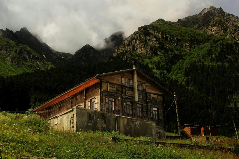 a view of the mountain and house