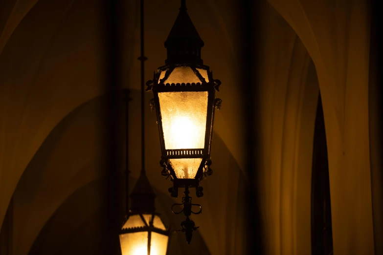 a light fixture that is in the corner of a room