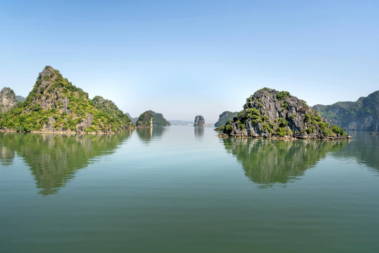 several small islands on the water in china