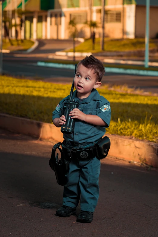 a  with a police uniform holding a bat