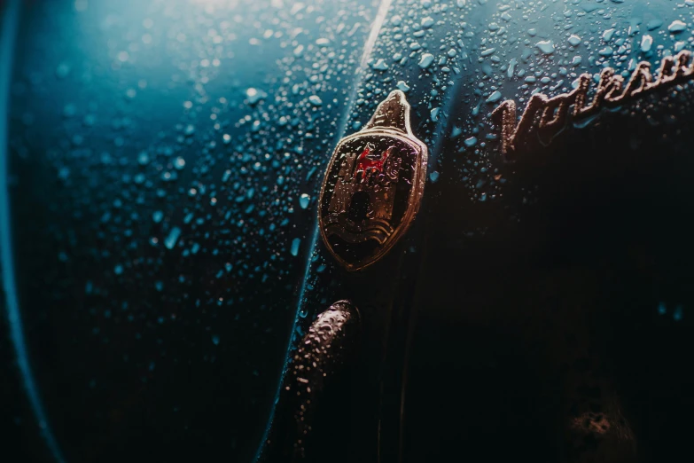 the inside of a car with rain and condery