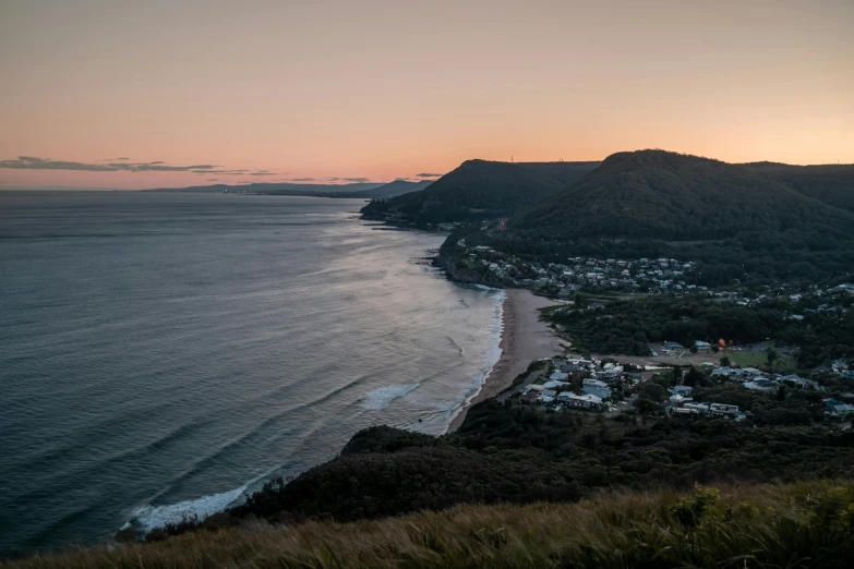 a view of a beautiful ocean and a town