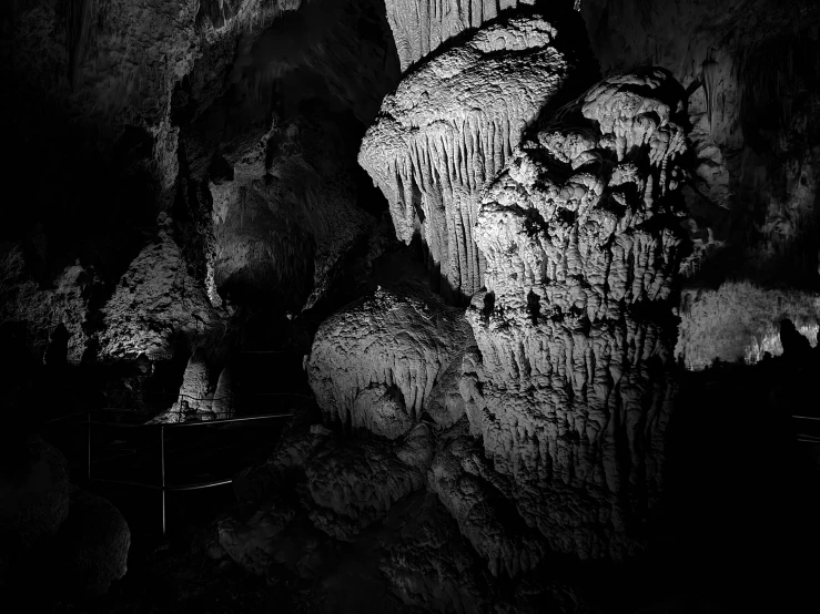 a black and white po of a cave