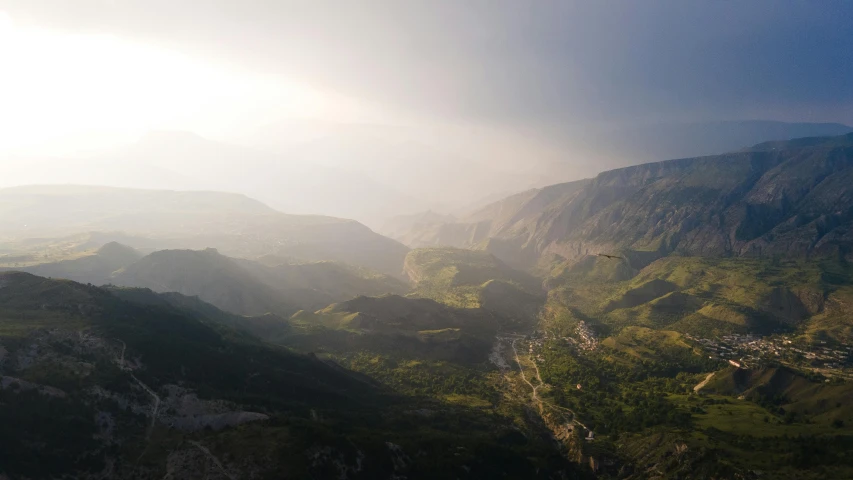 an aerial view of an arid mountain valley