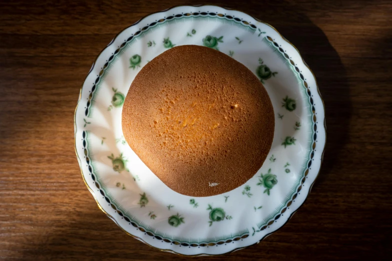 a bowl with soing in it that looks like a cake