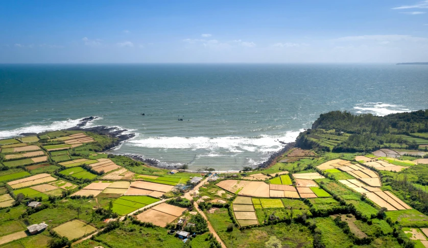 the ocean with small houses surrounded by land