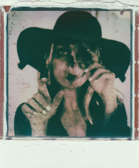 a woman is smoking with an old po frame