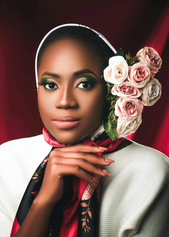 a woman posing for a po with roses on her head