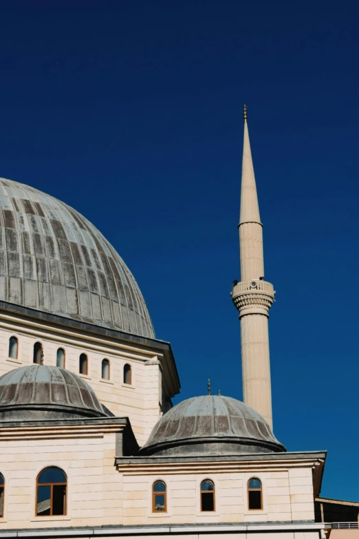 a building that has two large domes on it