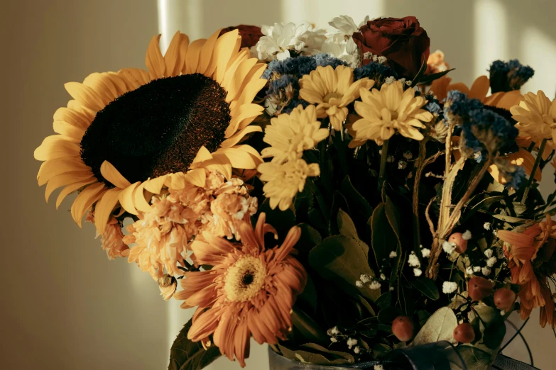 a vase with flowers inside it on a table