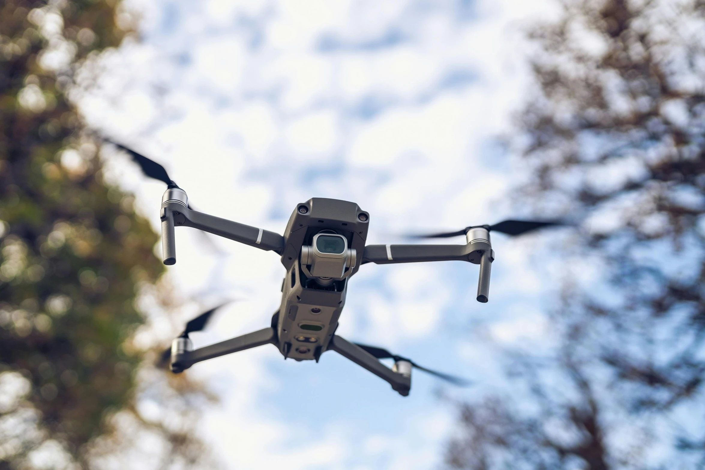 a large flying remote controlled camera system in the air