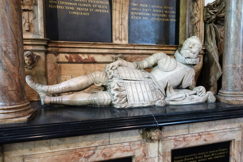 an elaborate display of a statue of a human being reclining