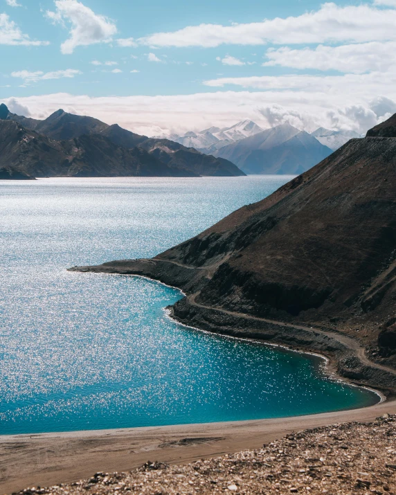 water in the mountains and a body of water below