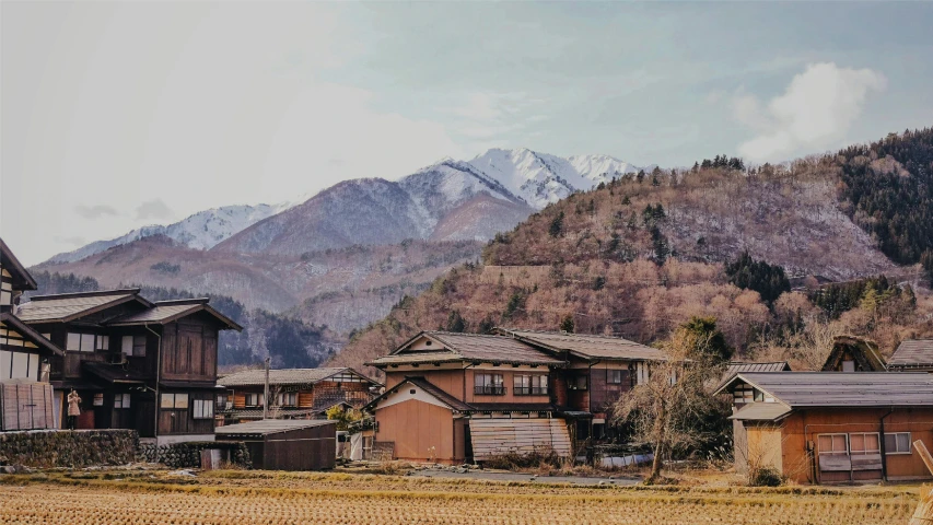 the city in front of a mountain range