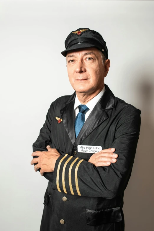 a man wearing a uniform is looking at the camera