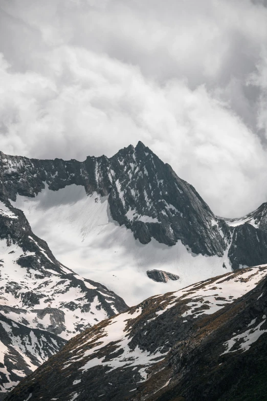 two mountains with snow on them in the snow