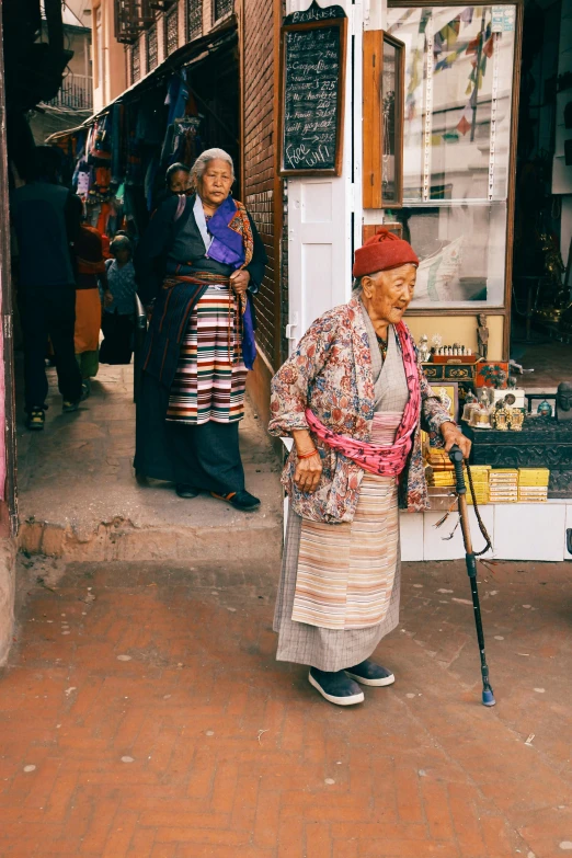 woman in a street market looking at the camera