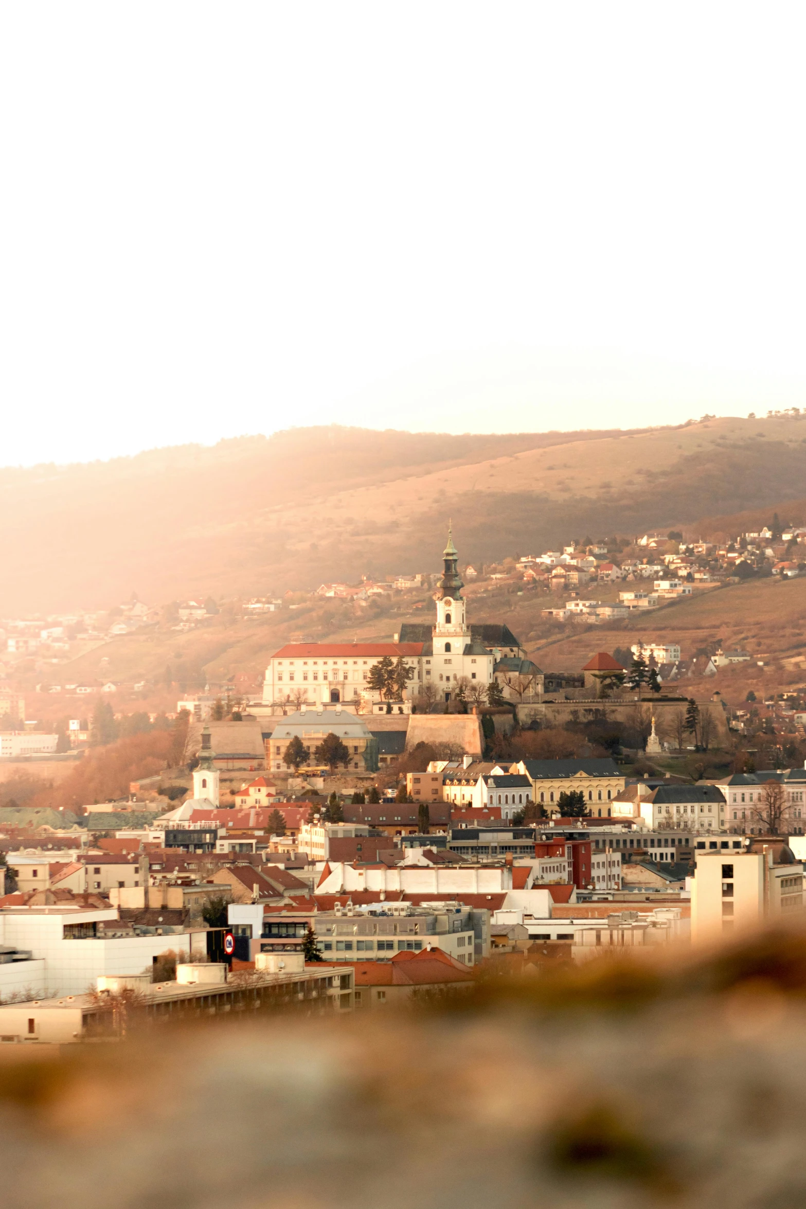 the city is surrounded by a mountain top