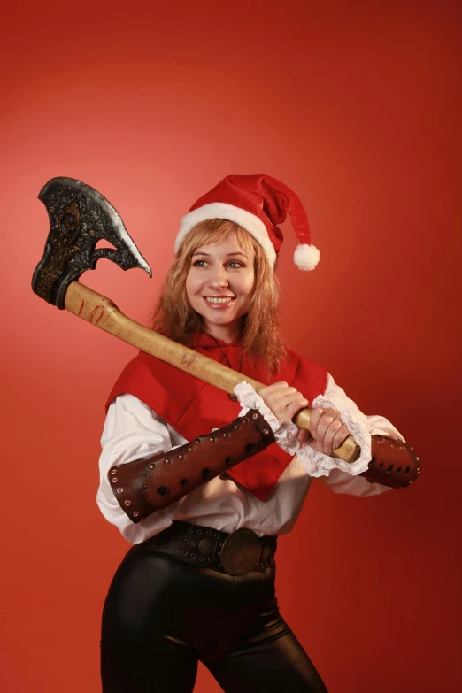 a pretty young lady in a santa claus costume